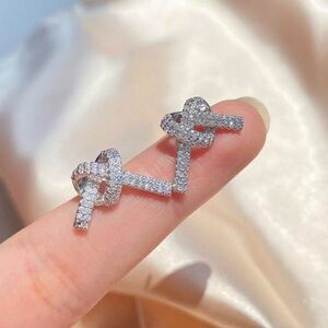 Silver Plated Stainless Steel Knot Earrings with Cubic Zirconia Sparkling Studs